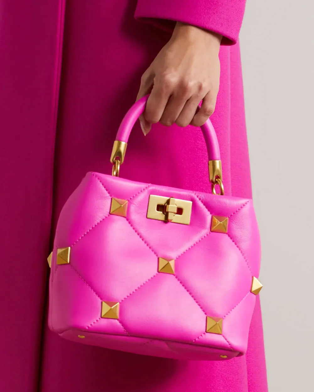 Roman Stud Quilted Top Handle Bag in Pink PP